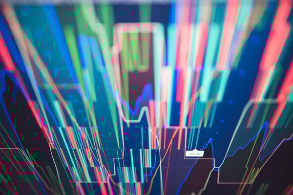 Abstract image of converging multi-colored lines representing high frequency data in cloud computing and adoptive AI systems